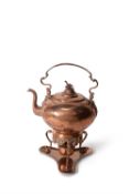 An English or German engraved copper tea kettle