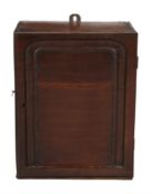 A George II mahogany and elm hanging wall cabinet