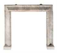 A variegated grey marble bolection moulded chimney piece