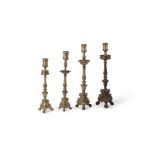 Four assorted Italian gilt bronze pricket altar sticks