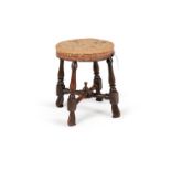 A Queen Anne walnut and beech stool