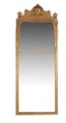 A George I gilt gesso and giltwood wall mirror