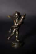 An Italian patinated bronze model of a putto with a dolphin after Andrea del Verrocchio (1435-1488)