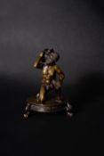 An Italian patinated bronze figural inkwell with Atlas supporting the globe