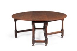A George II oak gateleg dining table