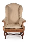 A walnut wing armchair