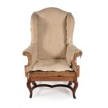 A walnut wing armchair