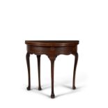 A George II oak side table or tea table