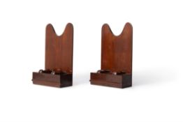 A pair of mahogany salver or plate stands