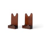 A pair of mahogany salver or plate stands