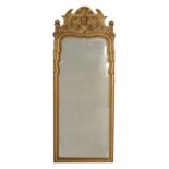 A George I carved giltwood wall mirror