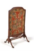 A George I mahogany and needlework inset fire screen