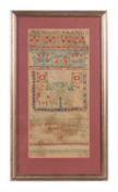 An English wool and silk needlework band sampler