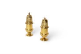 A pair of English brass casters