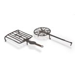 Two wrought iron trivet stands