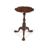 A George II carved mahogany candle stand