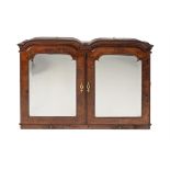 A George I walnut cabinet