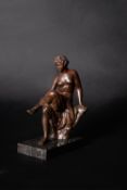 A fine North Italian patinated bronze model of a seated nymph
