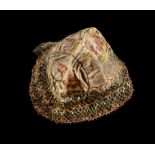 A Queen Anne embroidered bonnet