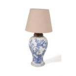 A large Chinese blue and white baluster vase adapted as a lamp