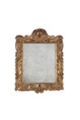 A Charles II carved giltwood wall mirror