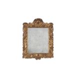 A Charles II carved giltwood wall mirror