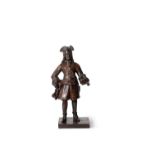 A rare sculpted oak model of a European merchant or army officer