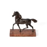 A French or Italian patinated bronze model of a prancing horse