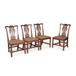 A set of four George III mahogany side chairs