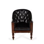 Y A Regency rosewood black leather upholstered library armchair