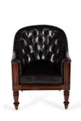 Y A Regency rosewood black leather upholstered library armchair