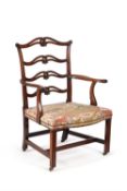 A George III mahogany open armchair