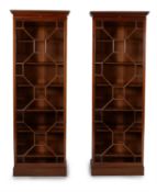A pair of mahogany bookcases, by HOWARD & SONS