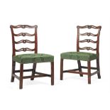 A set of seven mahogany dining chairs