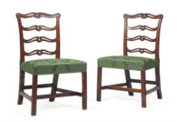 A set of seven mahogany dining chairs