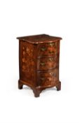 An unusual Dutch walnut and marquetry serpentine fronted chest