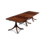 A George III mahogany triple pedestal dining table