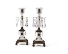 A pair of George III cut glass, ormolu and gilt porcelain mounted candlesticks