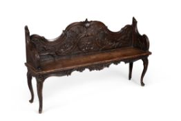 A George III mahogany and pine hall bench