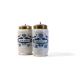 Two Dutch Delft blue and white cylindrical drug jars and gilt-metal covers