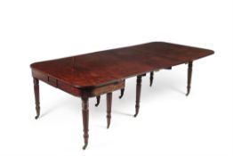 A Regency mahogany concertina action extending dining table