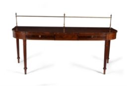 A mahogany bowfront serving table