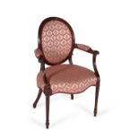 A George III mahogany and upholstered open armchair