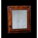 A William & Mary walnut cushion framed wall mirror