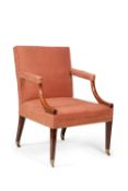 A George III mahogany and upholstered open armchair