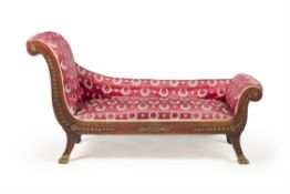 A mahogany and gilt metal mounted chaise longue