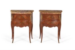 A pair of French tulip wood and oyster veneered bedside cabinets