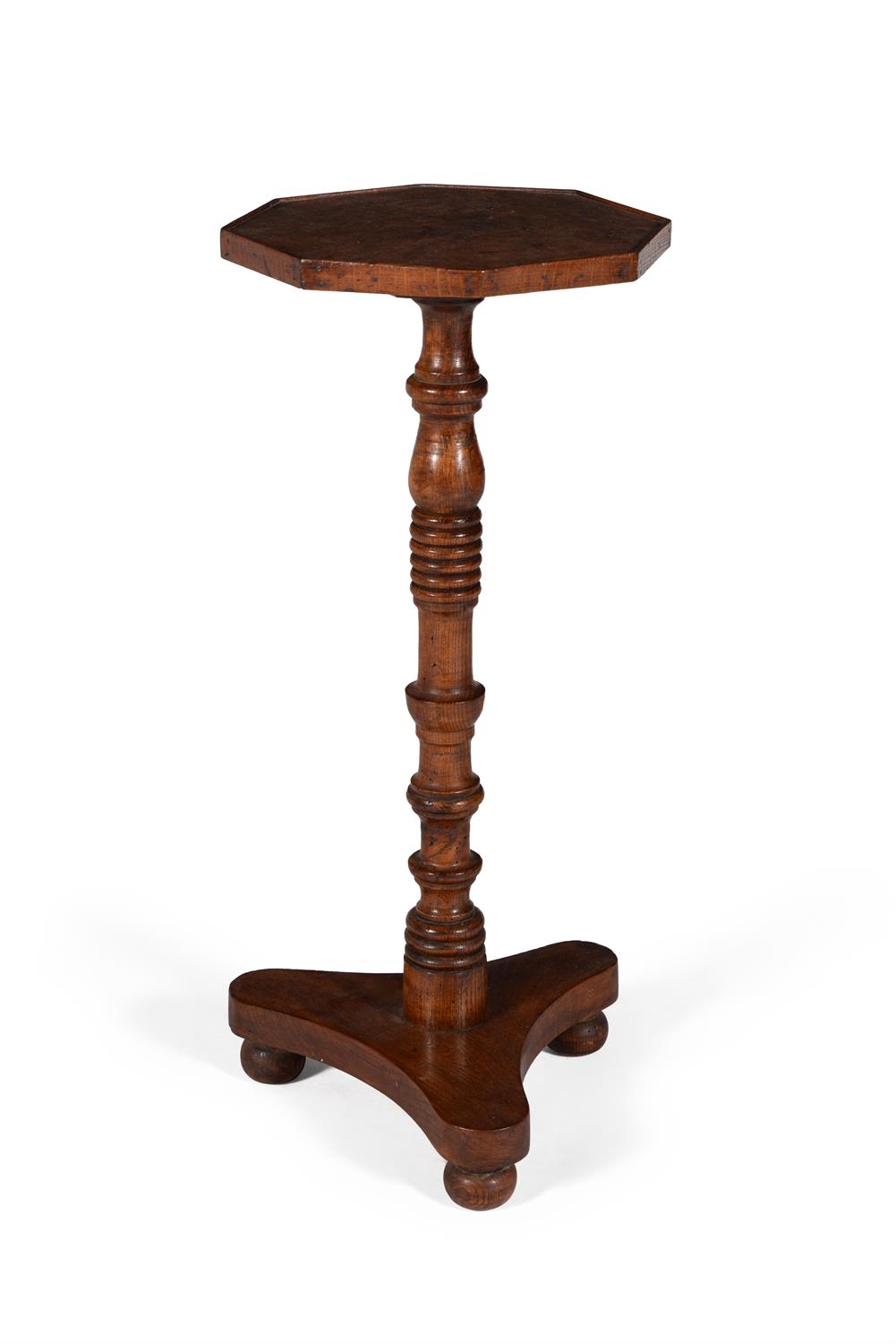 A George IV elm and burr elm octagonal pedestal table