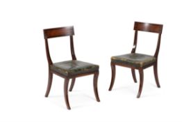 A matched set of twenty two Regency mahogany dining chairs