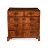 A George II walnut, crossbanded and pine chest of drawers